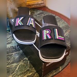 $119 NIB KARL LAGERFELD PARIS BLACK Jaxine Crystal Logo Platform Slides 9.5 M